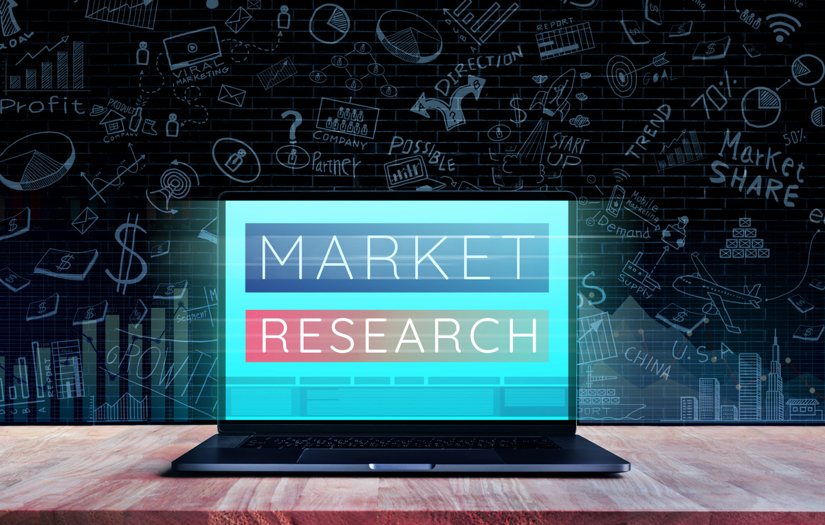Market research concepts with text on laptop.digital marketing